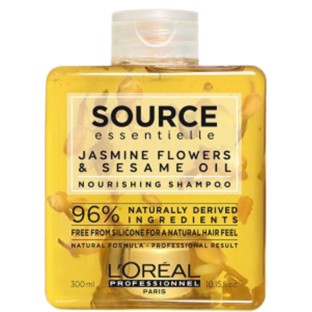 Bouteille de shampoing nourrissant source de la marque L'Oréal Pro à base de fleurs de jasmin et d'huile de sésame